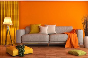 Orange lounge with grey sofa