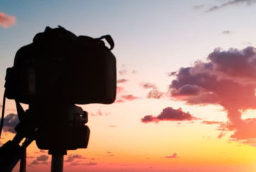 Camera in front of a sunset view