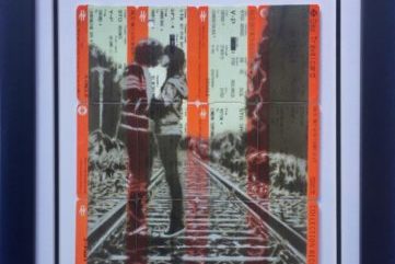 Sprayed train tickets framed