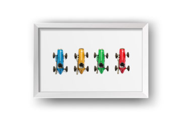 colourful toy cars framed in a box frame