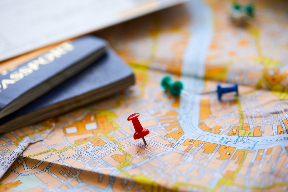 Pins,Marking,Travel,Itinerary,Points,On,Map,And,Passport